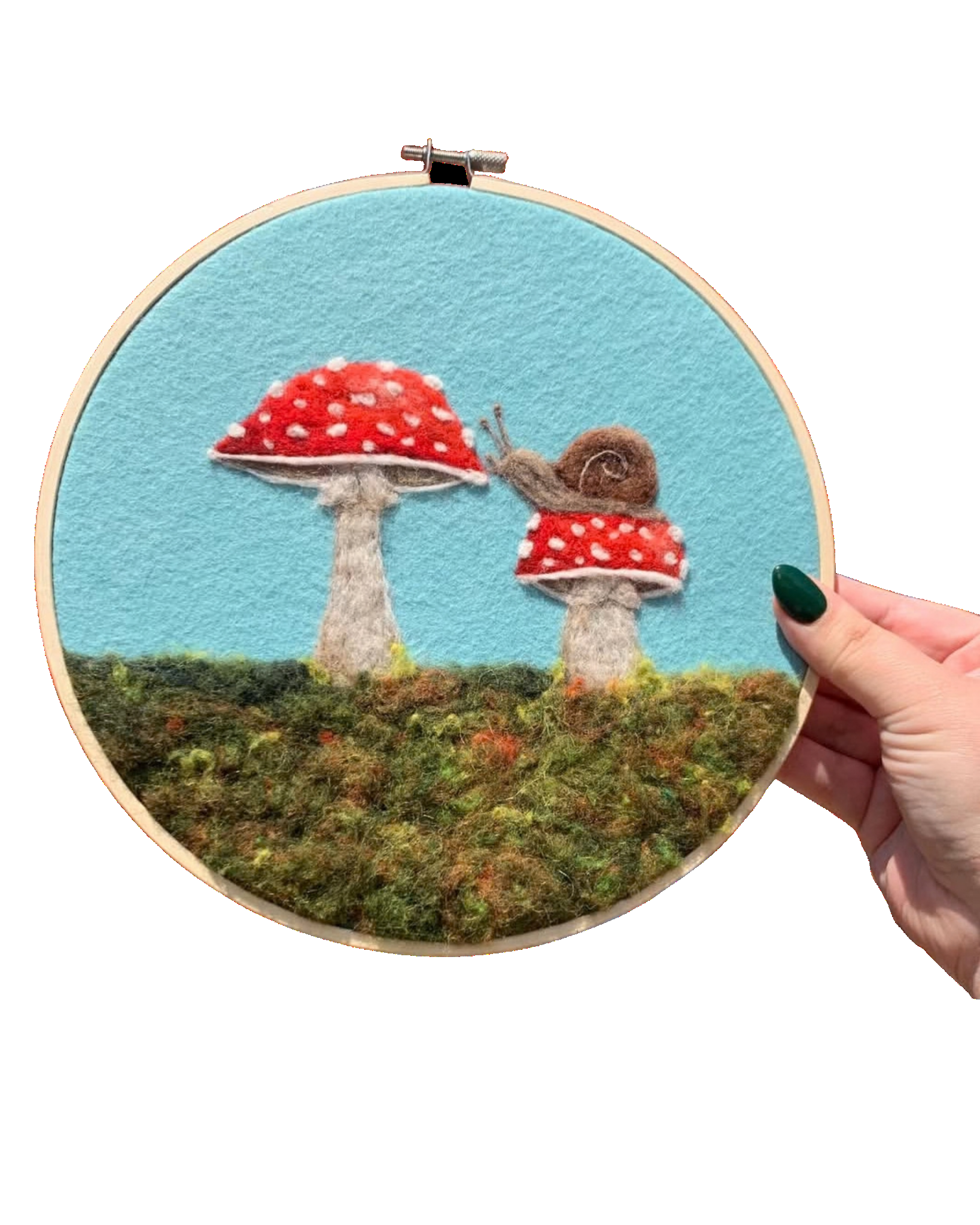 The original Leaf Pile Studios needle-felted hoop artwork, featuring whimsical mushrooms and a snail